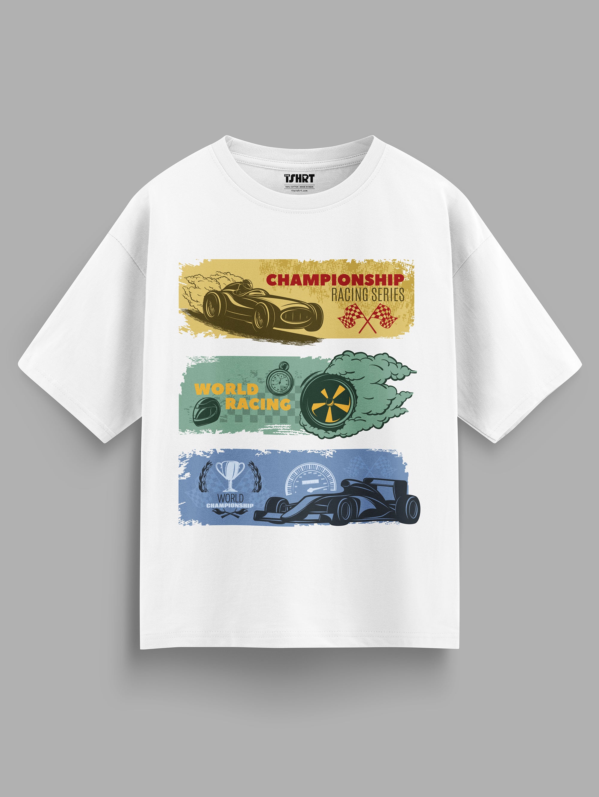 White oversized t-shirt with racing-themed graphics on a gray background