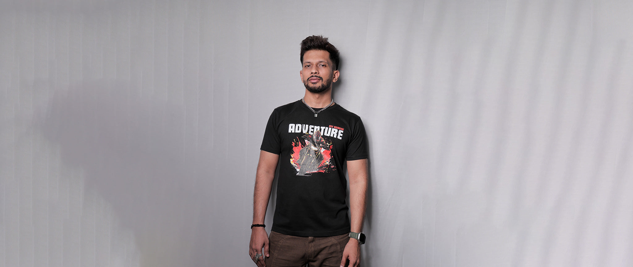 Riding Merchandise -Pure cotton T-shirts for Motorcyclists, Riders, Bikers, etc. Black Adventure tshirt wearing a model with confidence. 